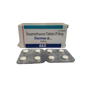 The image shows a box of Decmax 8 mg, which contains Dexamethasone Tablets IP 8mg. The packaging is white with a teal stripe at the top and a dark blue base featuring the GLS logo. In front of the box is a silver blister pack containing eight small, round white tablets. The box indicates a quantity of 5 x 8 Tablets.