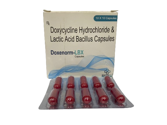 A white medicine box and a blister pack for Doxenorm-LBX Capsules are displayed against a plain background. The box prominently lists the active ingredients as Doxycycline Hydrochloride & Lactic Acid Bacillus Capsules. The brand name is printed in a blue and green font above a decorative blue wavy pattern. A blister pack in the foreground contains ten dark red capsules arranged in two rows of five. The top right of the box indicates a quantity of 10 x 10 Capsules, and the manufacturer's name, Enormmed, is visible at the bottom right.