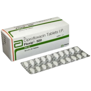 This image showcases a box and a blister pack of Floxip-500, which are Ciprofloxacin Tablets I.P. in a 500 mg dosage. The box is primarily white with green and orange accents, featuring the Abbott logo. It specifies a pack configuration of 10 x 2 x 10 Tablets. In front of the box is a silver foil blister pack containing several white, oval-shaped tablets.